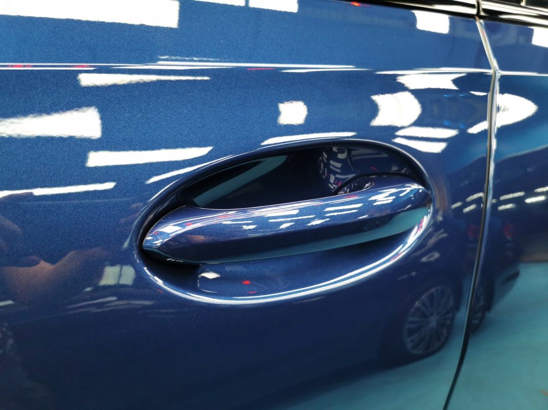 Rear quarter of the X6, glossy and protected.