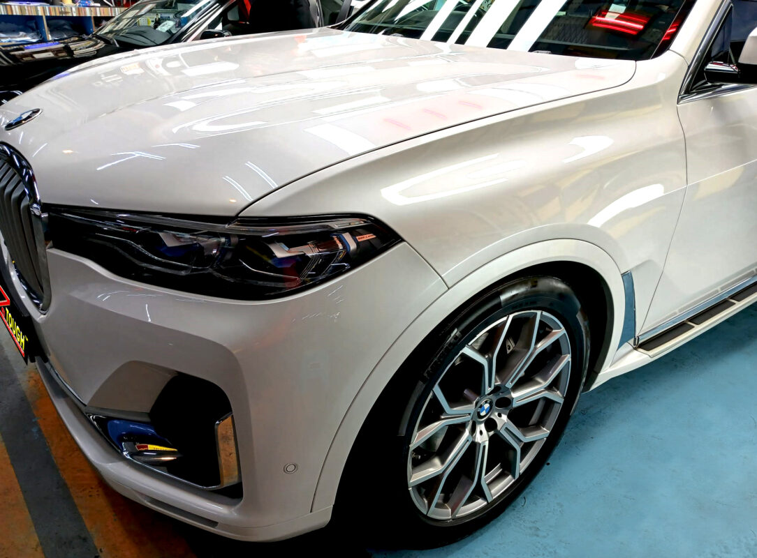 The BMW X7 from a side angle after the titanium coating.