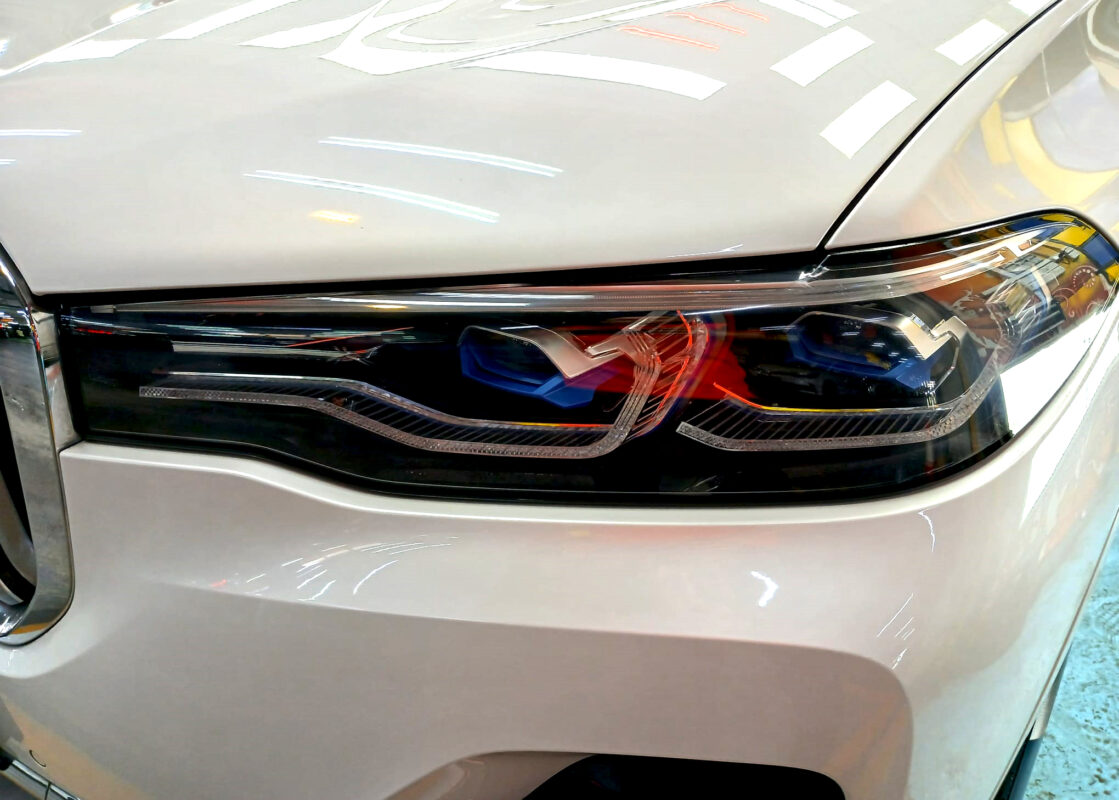 The X7's coated paintwork showing clean reflections.