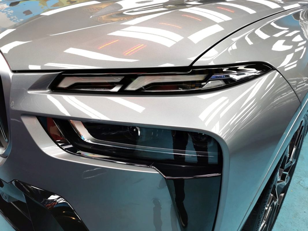 The X7's coated paintwork showing clean reflections.