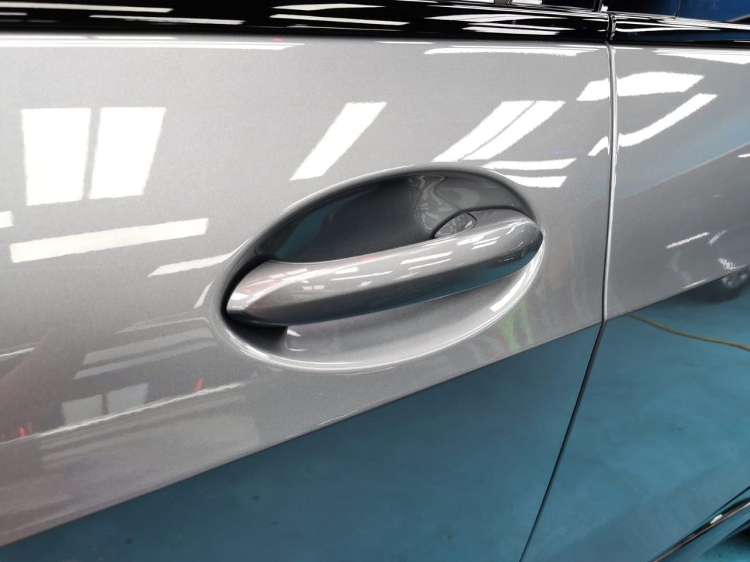 Front three-quarter view of the BMW X7 after coating.