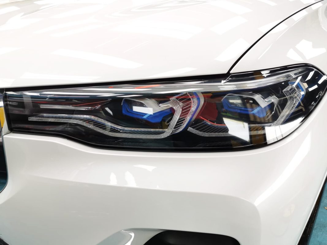 The X7's coated paintwork showing clean reflections.