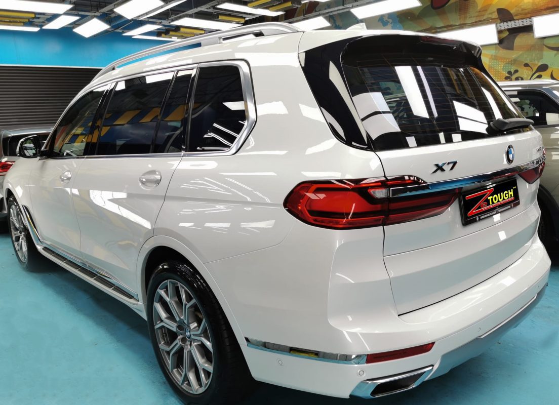 Rear quarter of the BMW X7, glossy and protected.