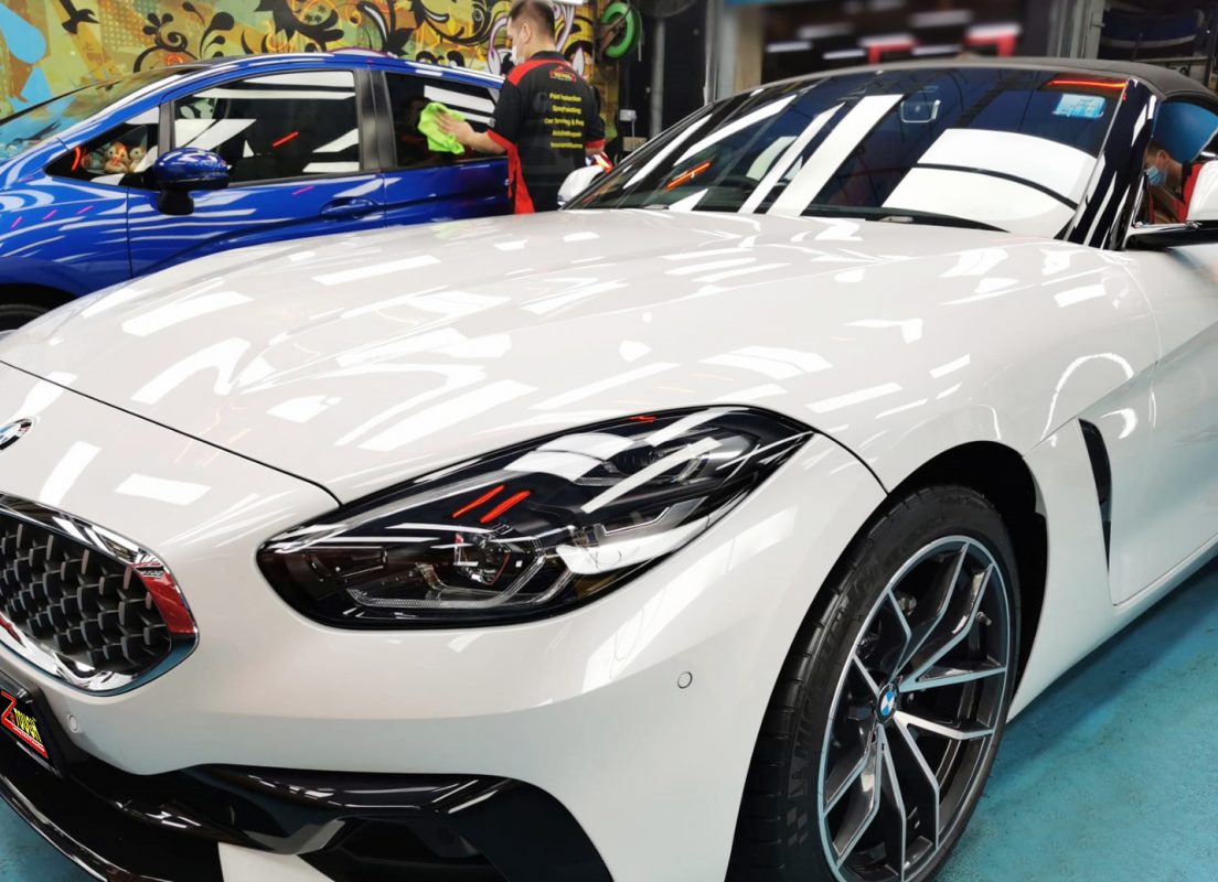 The BMW Z4 sDrive20i from a side angle after the ceramic coating.