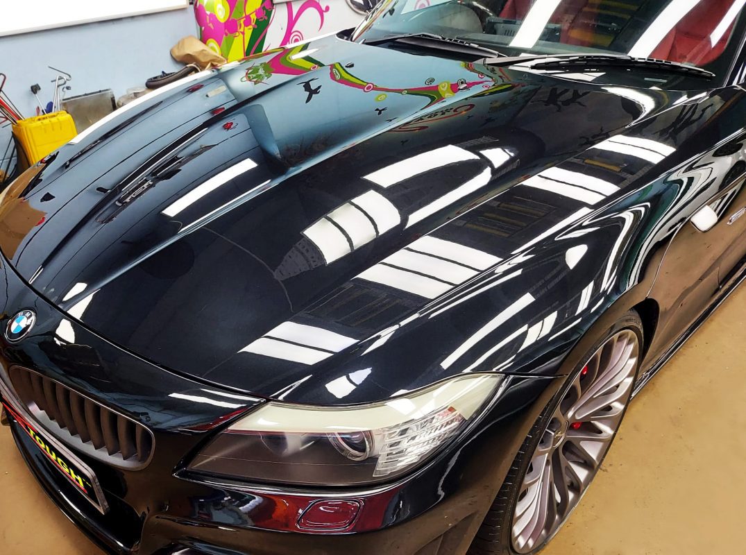The BMW Z4 from a side angle after the ceramic coating.