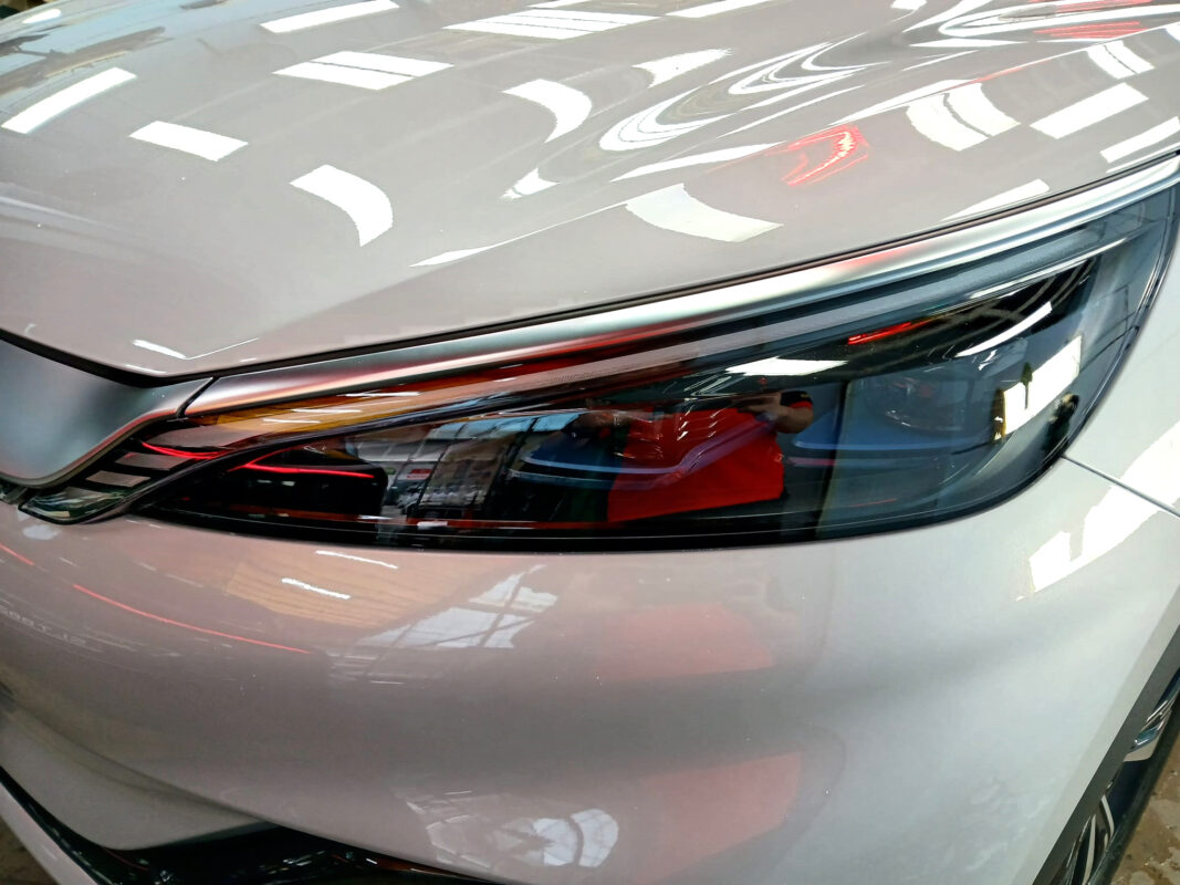 The Atto 3's coated paintwork showing clean reflections.