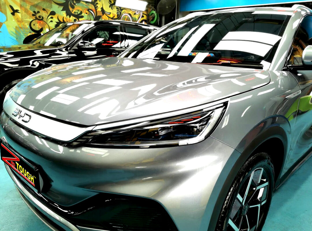 The BYD Atto 3's coated paintwork under workshop lighting.