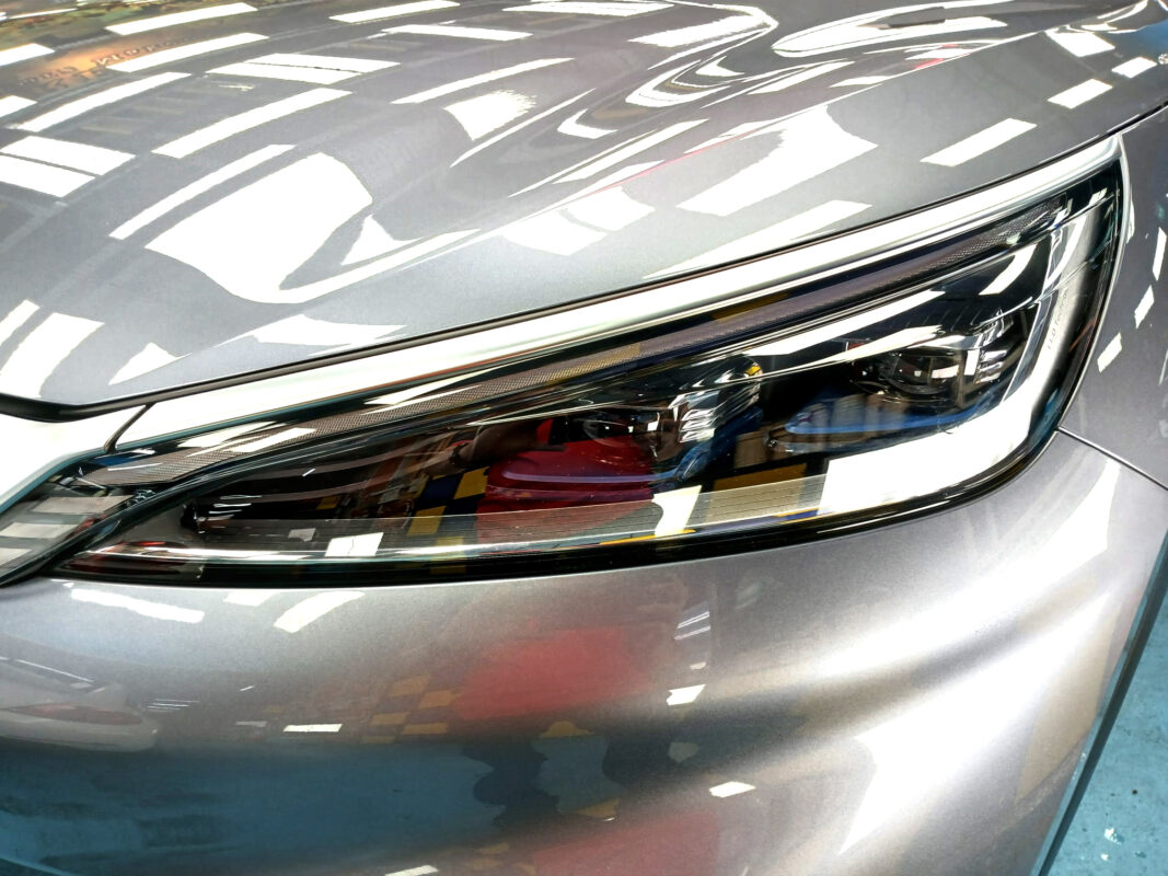 The ATTO 3's coated paintwork showing clean reflections.