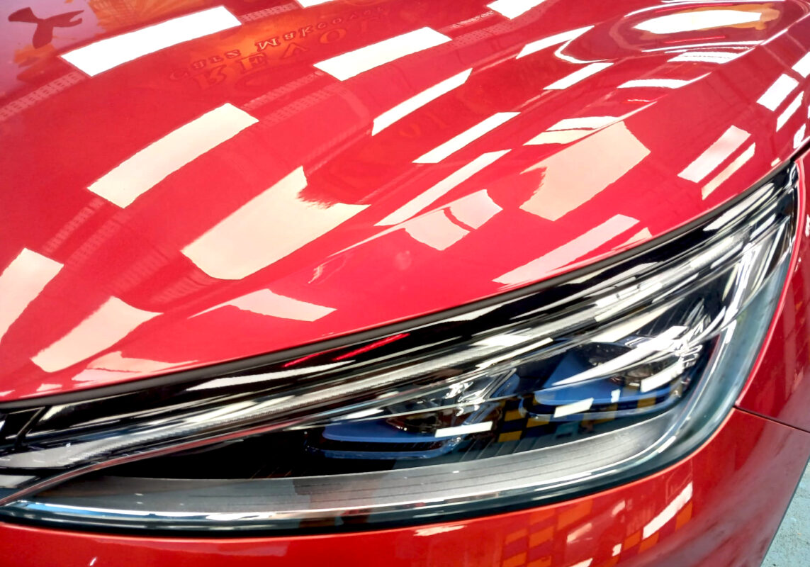 The ATTO 3's coated paintwork showing clean reflections.