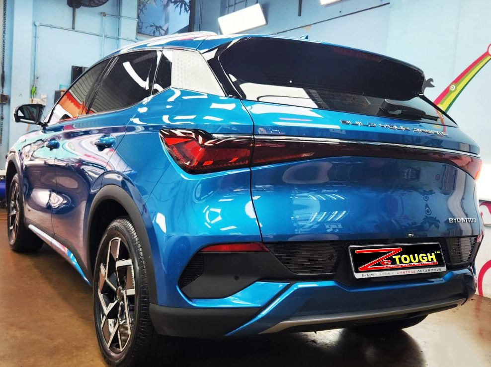 Rear quarter of the BYD Atto 3, glossy and protected.