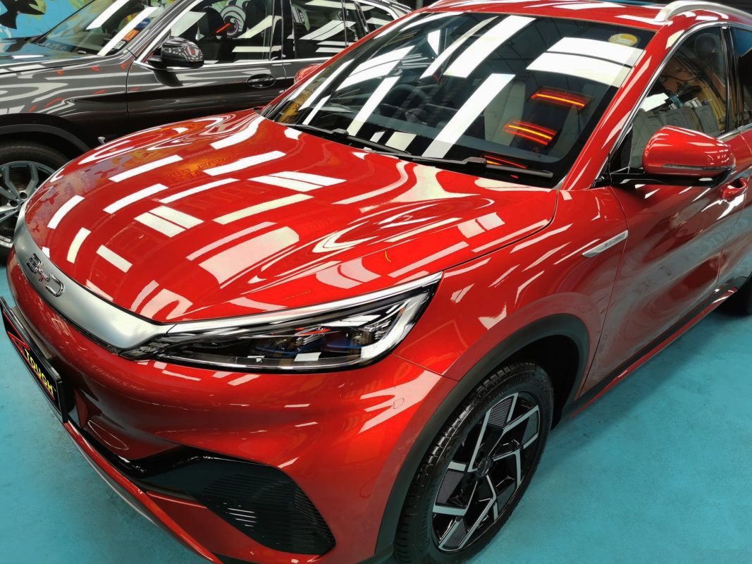 The BYD Atto 3 from a side angle after the ceramic coating.
