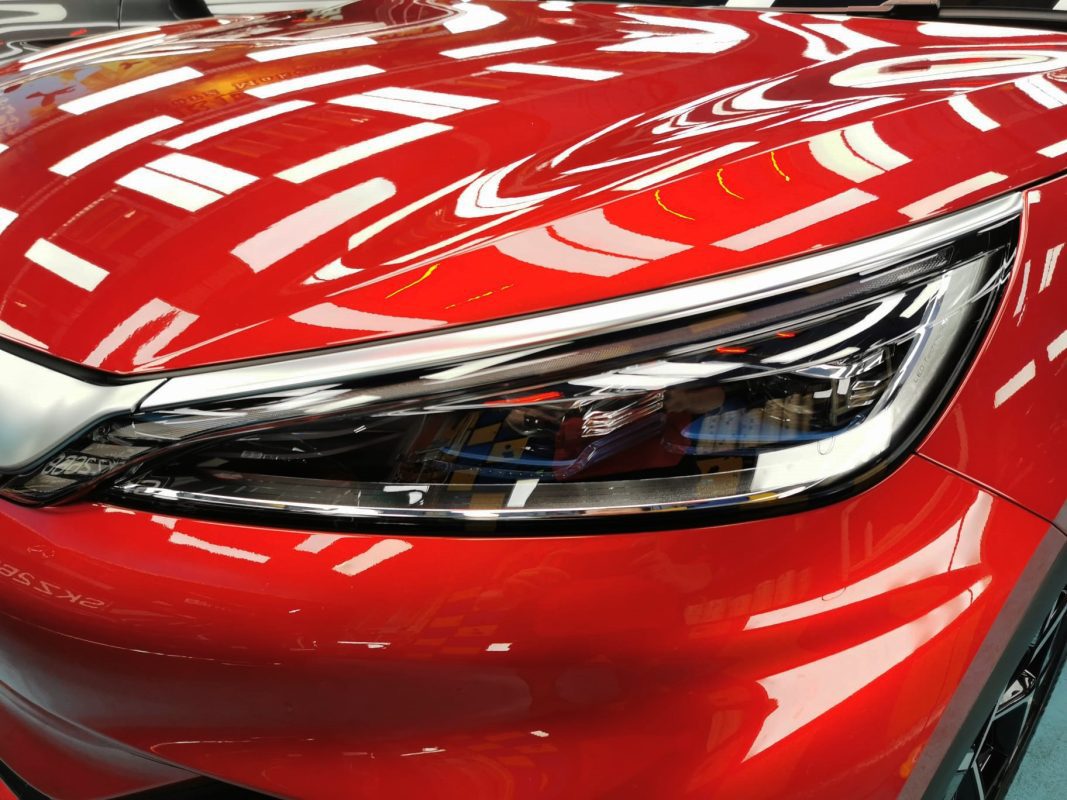 The Atto 3's coated paintwork showing clean reflections.