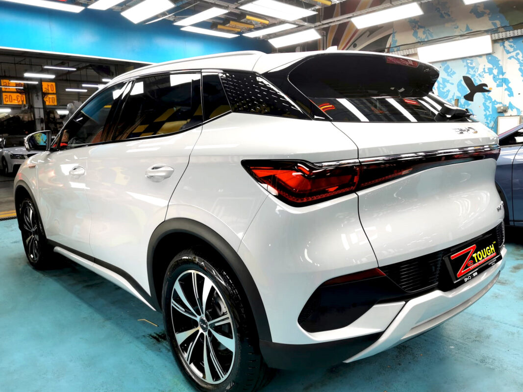 Rear quarter of the BYD Atto 3, glossy and protected.