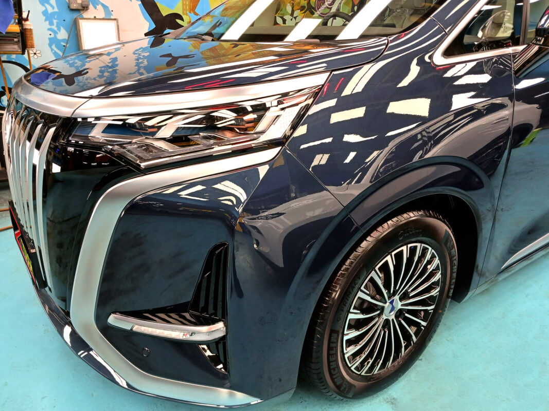The BYD DENZA D9 from a side angle after the titanium coating.