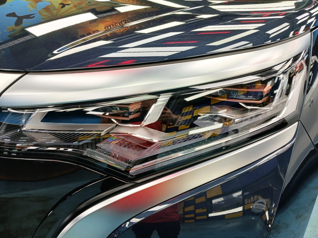 The DENZA D9's coated paintwork showing clean reflections.
