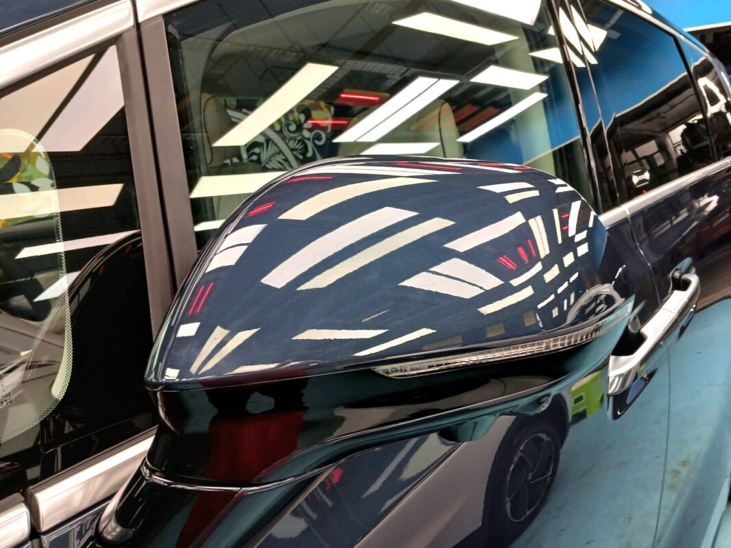 The BYD DENZA D9 parked in the workshop, freshly coated.