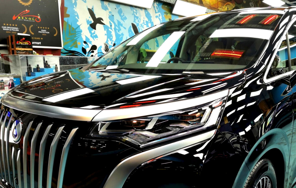 The BYD Denza from a side angle after the titanium coating.