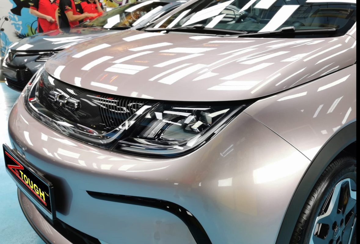 The BYD Dolphin Dynamic from a side angle after the titanium coating.
