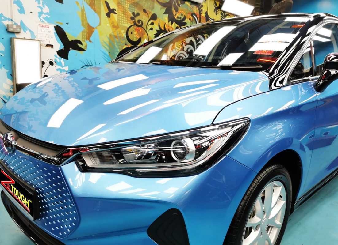 The BYD E6 from a side angle after the ceramic coating.