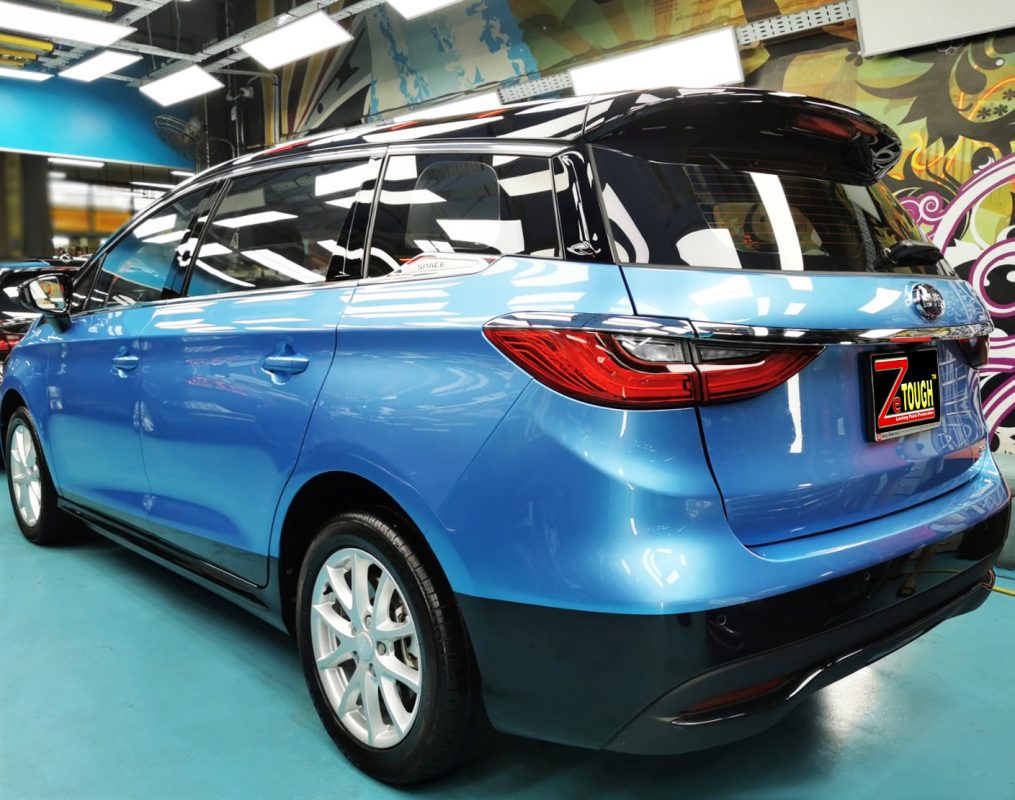 Rear quarter of the BYD E6, glossy and protected.