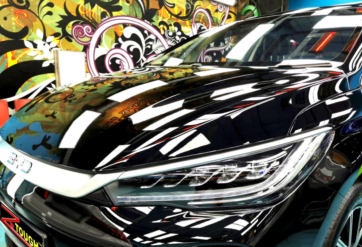 The BYD M6 from a side angle after the titanium coating.