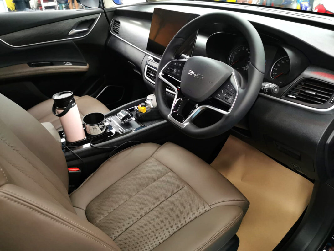 Front three-quarter view of the BYD M6 after coating.