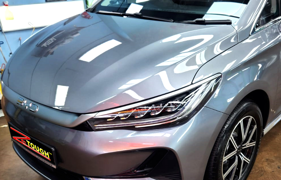 The BYD M6 from a side angle after the titanium coating.