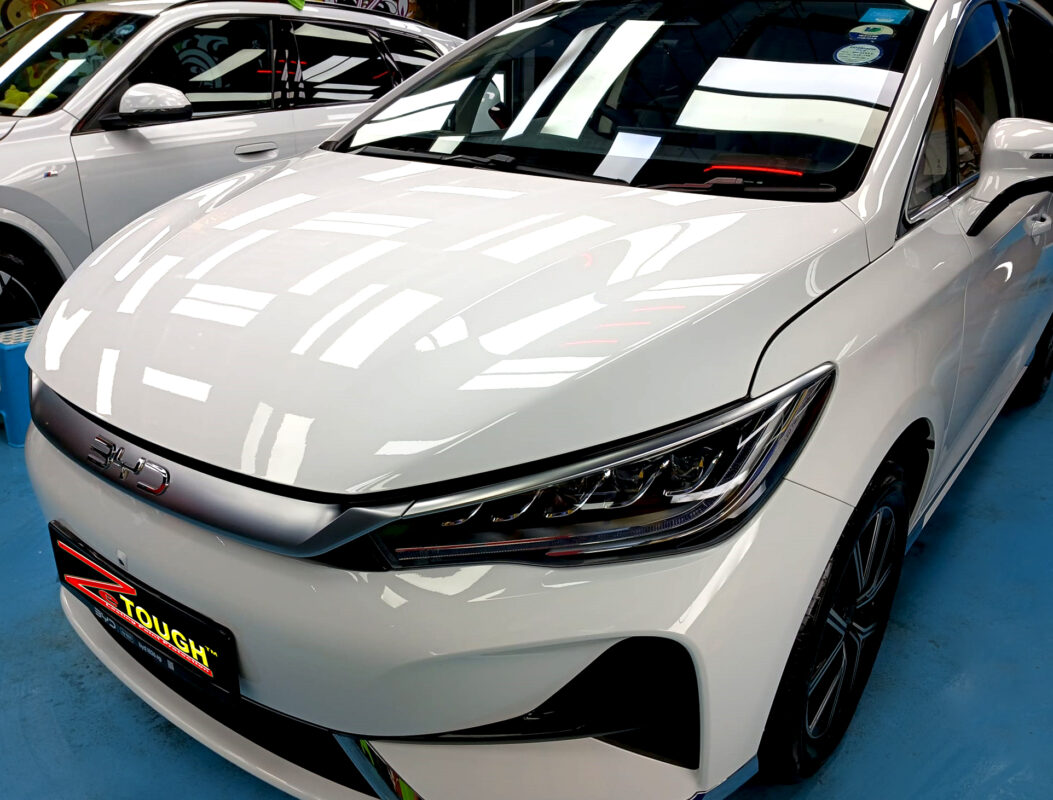 The BYD M6 from a side angle after the ceramic coating.