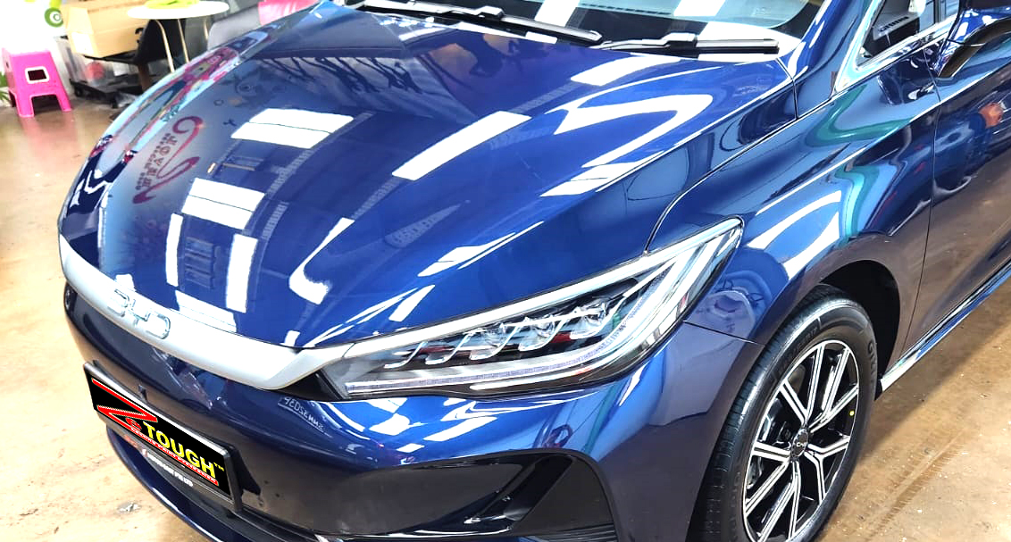 The BYD M6 from a side angle after the ceramic coating.