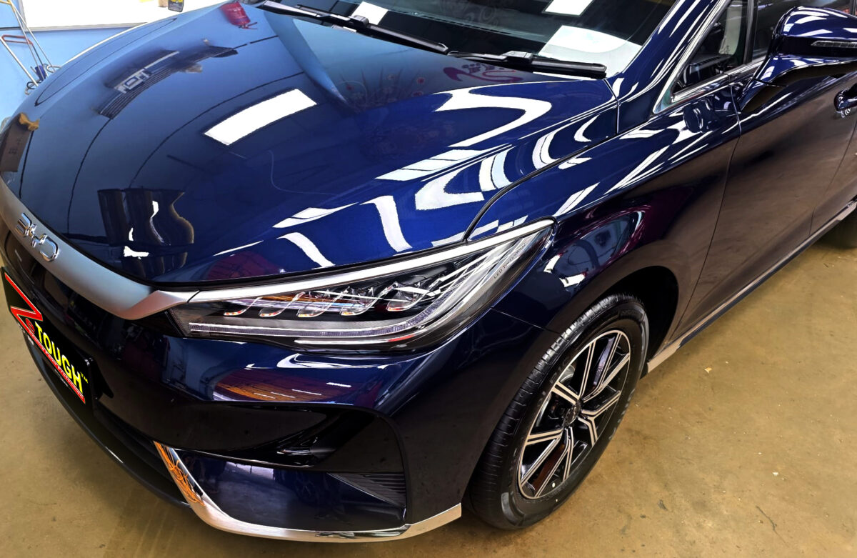 The BYD M6 from a side angle after the ceramic coating.