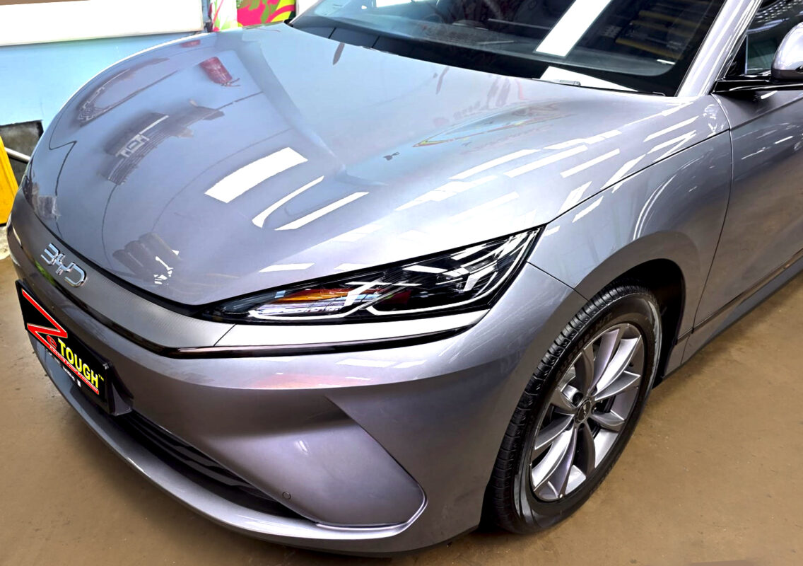 The BYD Seal 6's coated paintwork under workshop lighting.