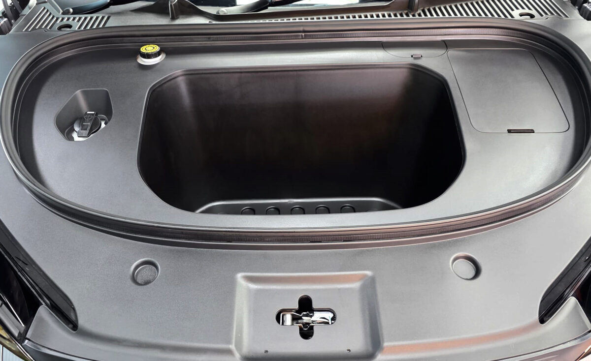Reflections across the coated panels of the BYD Seal 6.