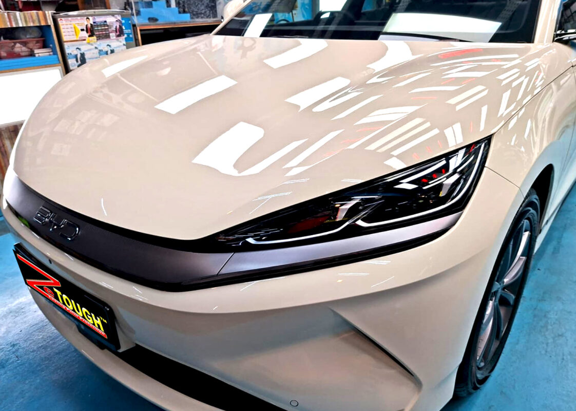 The BYD Seal 6's coated paintwork under workshop lighting.