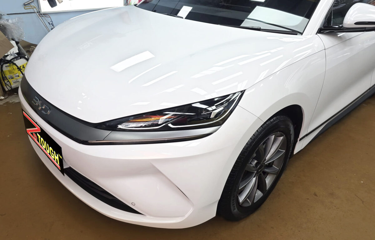 The BYD Seal 6's coated paintwork under workshop lighting.