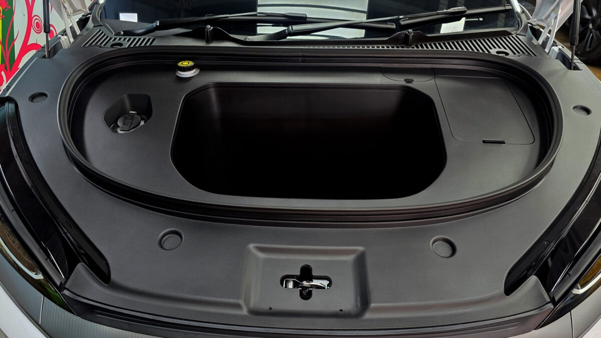Reflections across the coated panels of the BYD Seal 6.