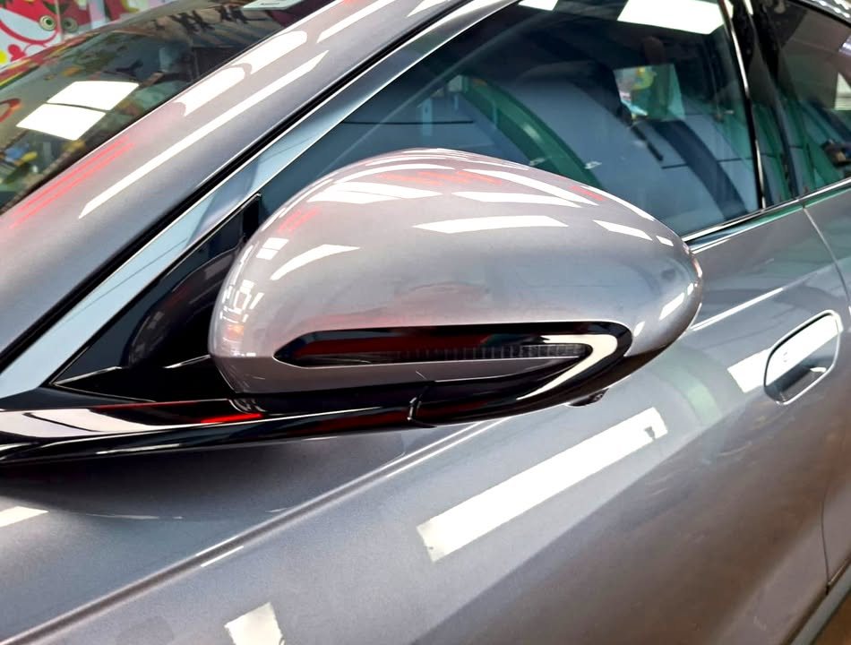 Grey door mirror with indicator strip on the BYD Seal 6.