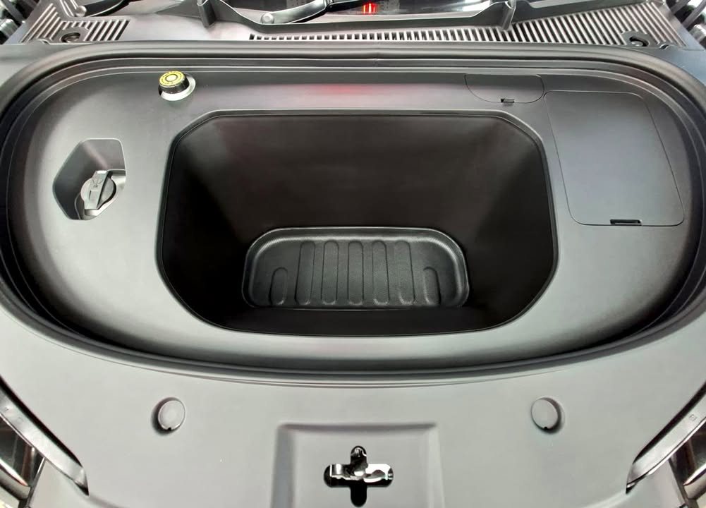 Front storage compartment of the BYD Seal 6 with a black liner.