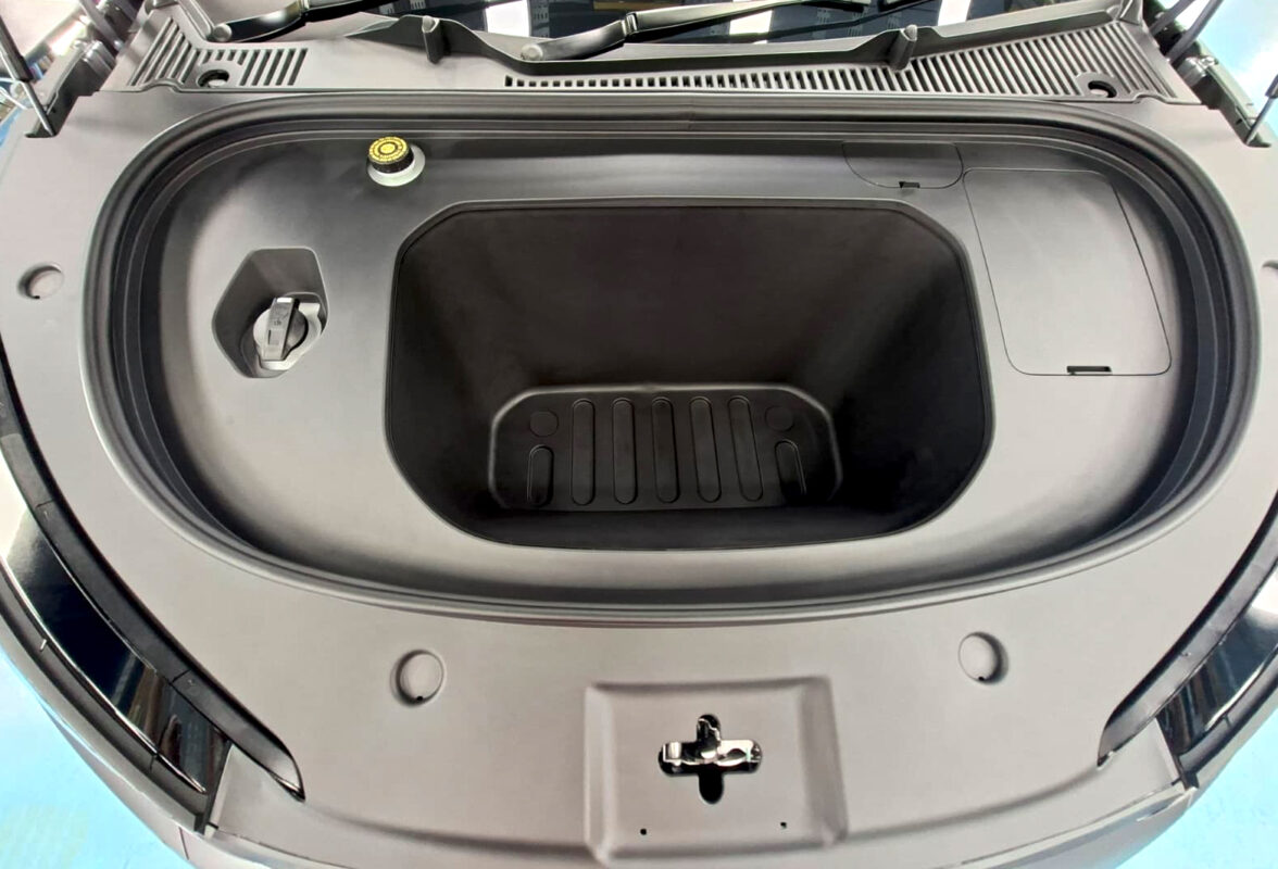 Reflections across the coated panels of the BYD Seal 6.