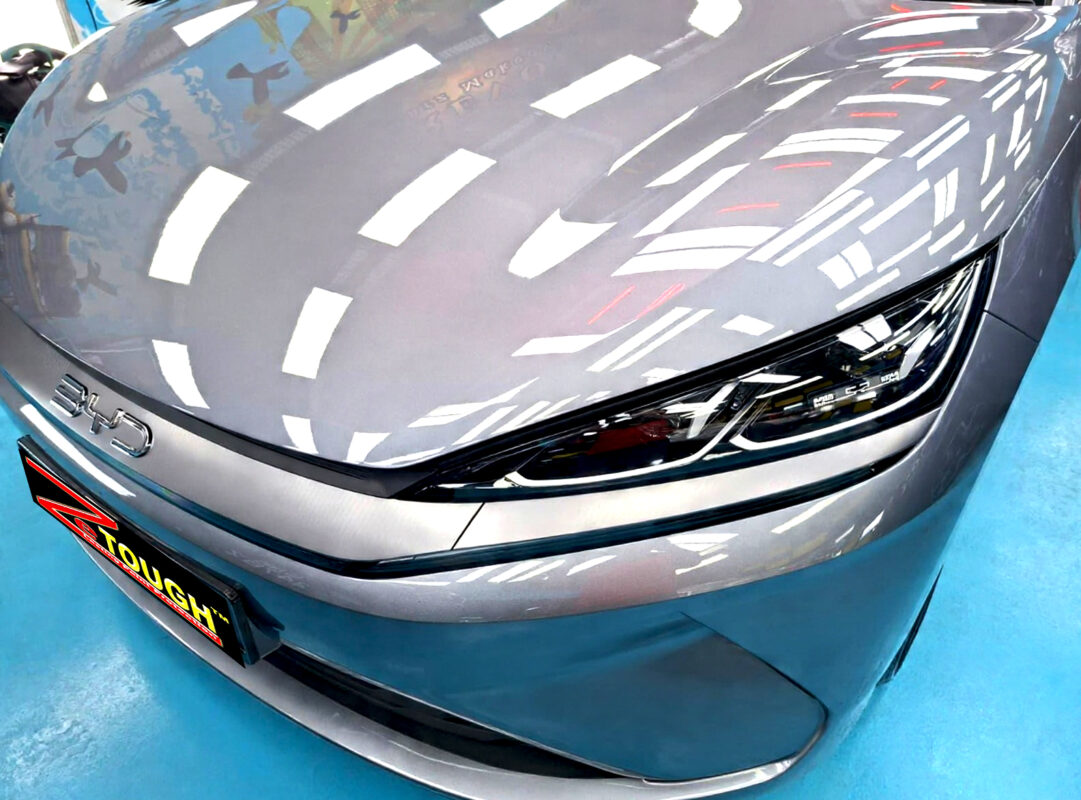 The BYD Seal 6's coated paintwork under workshop lighting.
