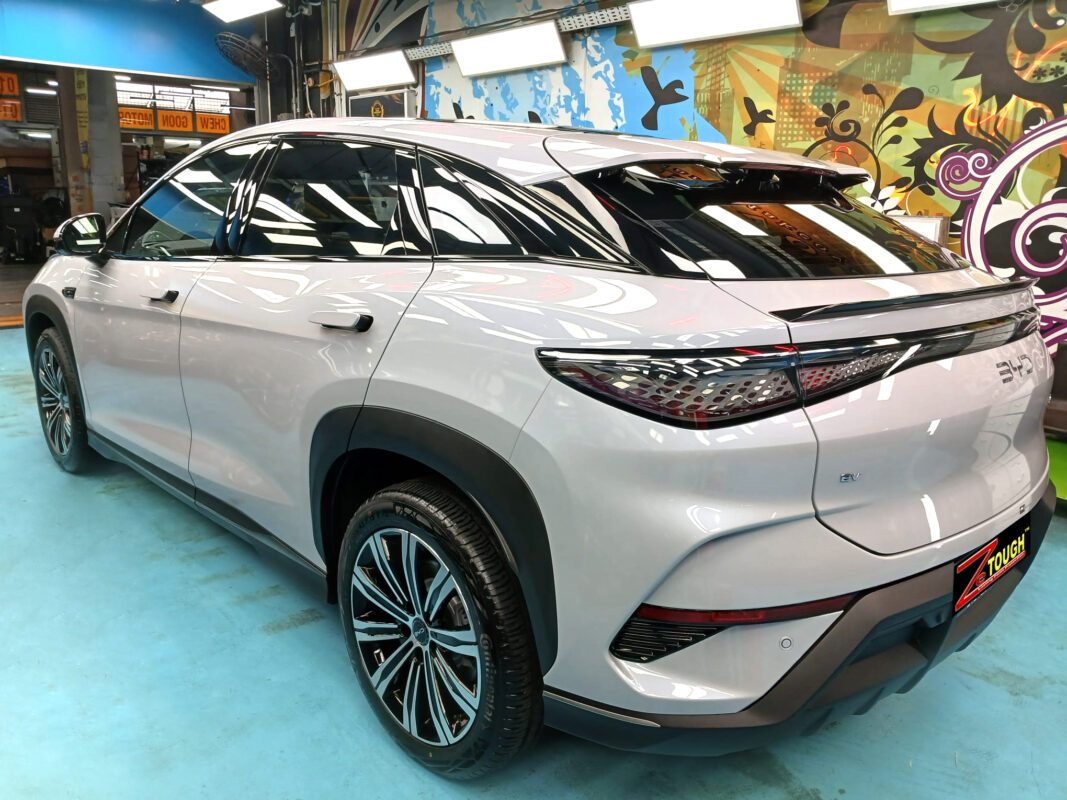 Rear quarter of the BYD Sealion, glossy and protected.