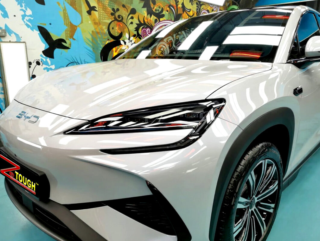 The BYD Sealion 7's coated paintwork under workshop lighting.