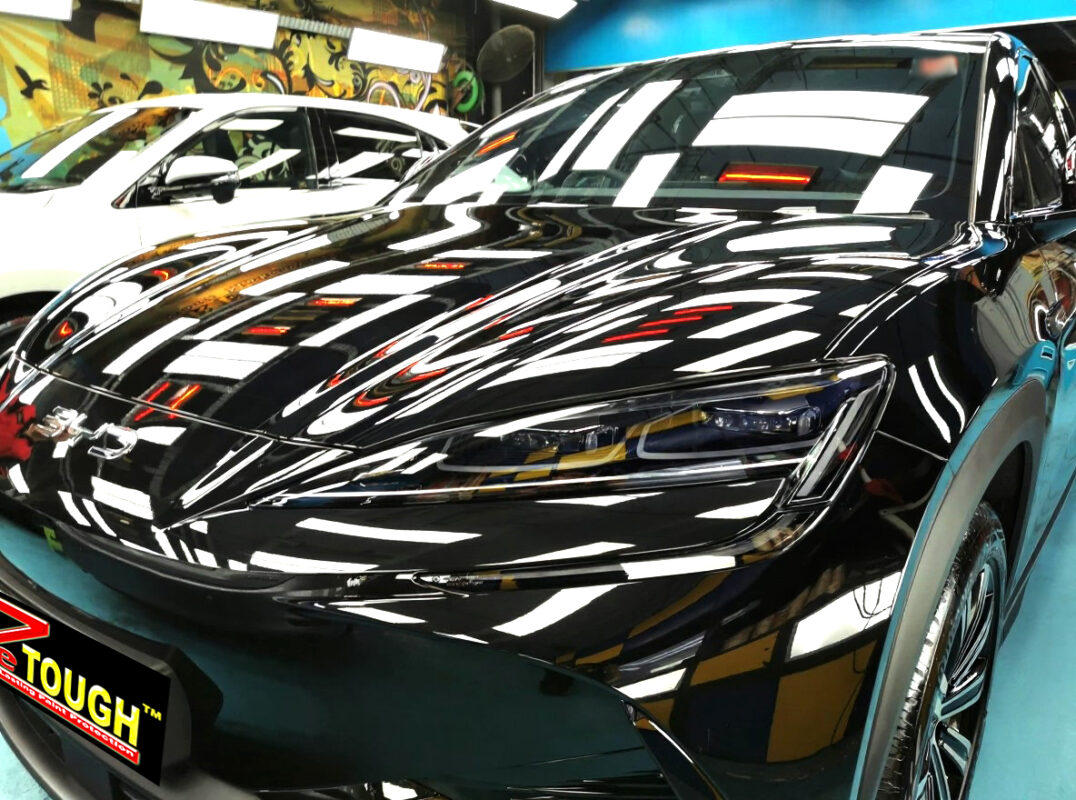 The BYD Sealion 7's coated paintwork under workshop lighting.