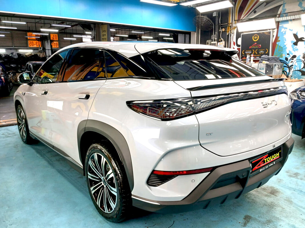 Rear quarter of the BYD Sealion 7, glossy and protected.