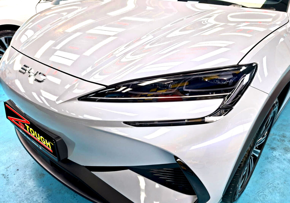 The BYD Sealion 7's coated paintwork under workshop lighting.