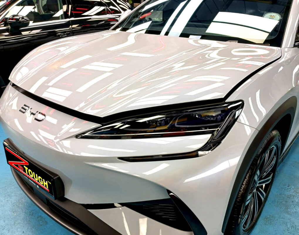 The BYD Sealion 7's coated paintwork under workshop lighting.