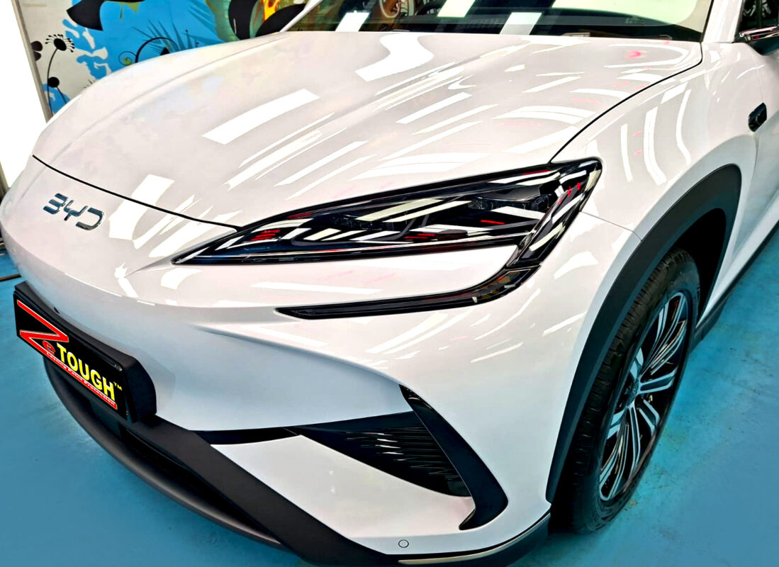The BYD Sealion 7's coated paintwork under workshop lighting.