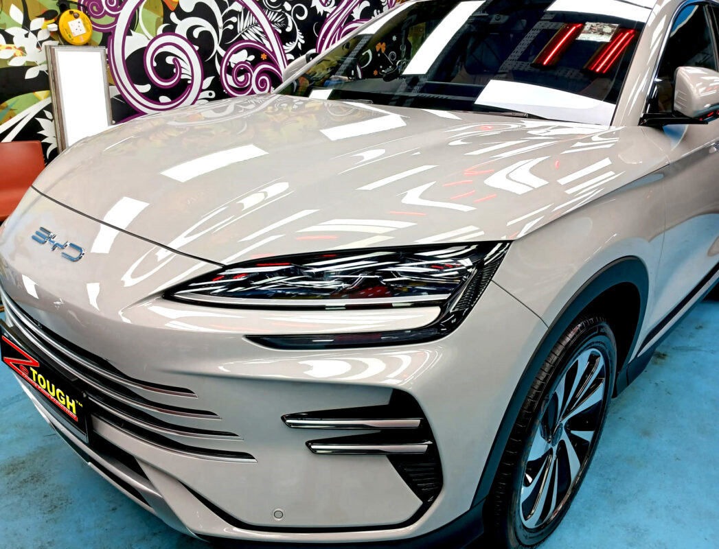 The BYD Sealion from a side angle after the ceramic coating.
