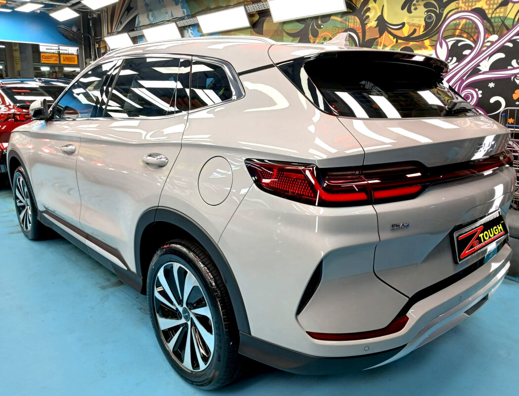 Rear quarter of the BYD Sealion, glossy and protected.