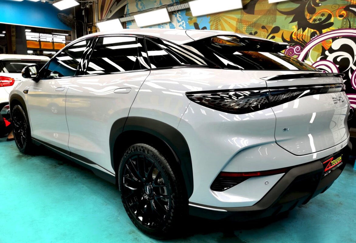 Rear quarter of the BYD Sealion, glossy and protected.