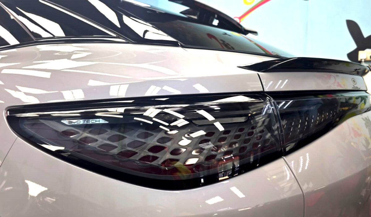 Rear quarter of the BYD Sealion 7, glossy and protected.
